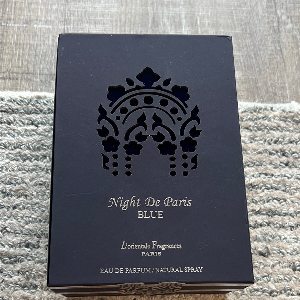 Perfume   Night De Paris Blue 
3.3 oz    Never used